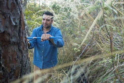 Doctoral student Diego Pons takes a tree core sample from a Guatemalan fir tree. Photo courtesy Daniel Griffin.